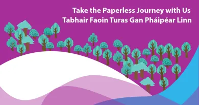 The image shows a purple background with multiple trees. The text on top left reads in English "Take the Paperless Journey with Us" with Irish translation underneath "Tabhair Faoin Turas Gan Pháipéar Linn " 